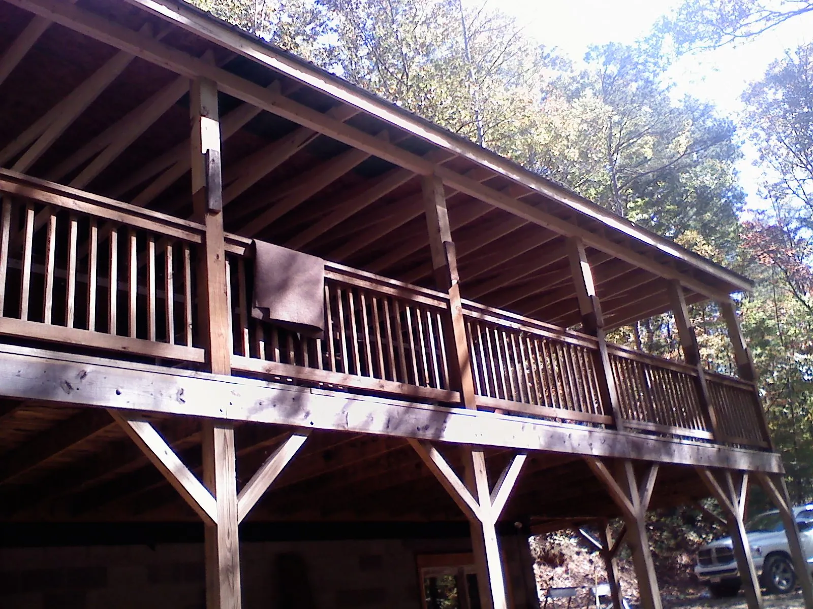 Timber framing under a new elevated porch and deck — Roof Leak Repair in Hallsville by Roofing Brothers